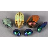 A LATE 19TH CENTURY SNUFF BOX in EPNS containing several iridescent beetles