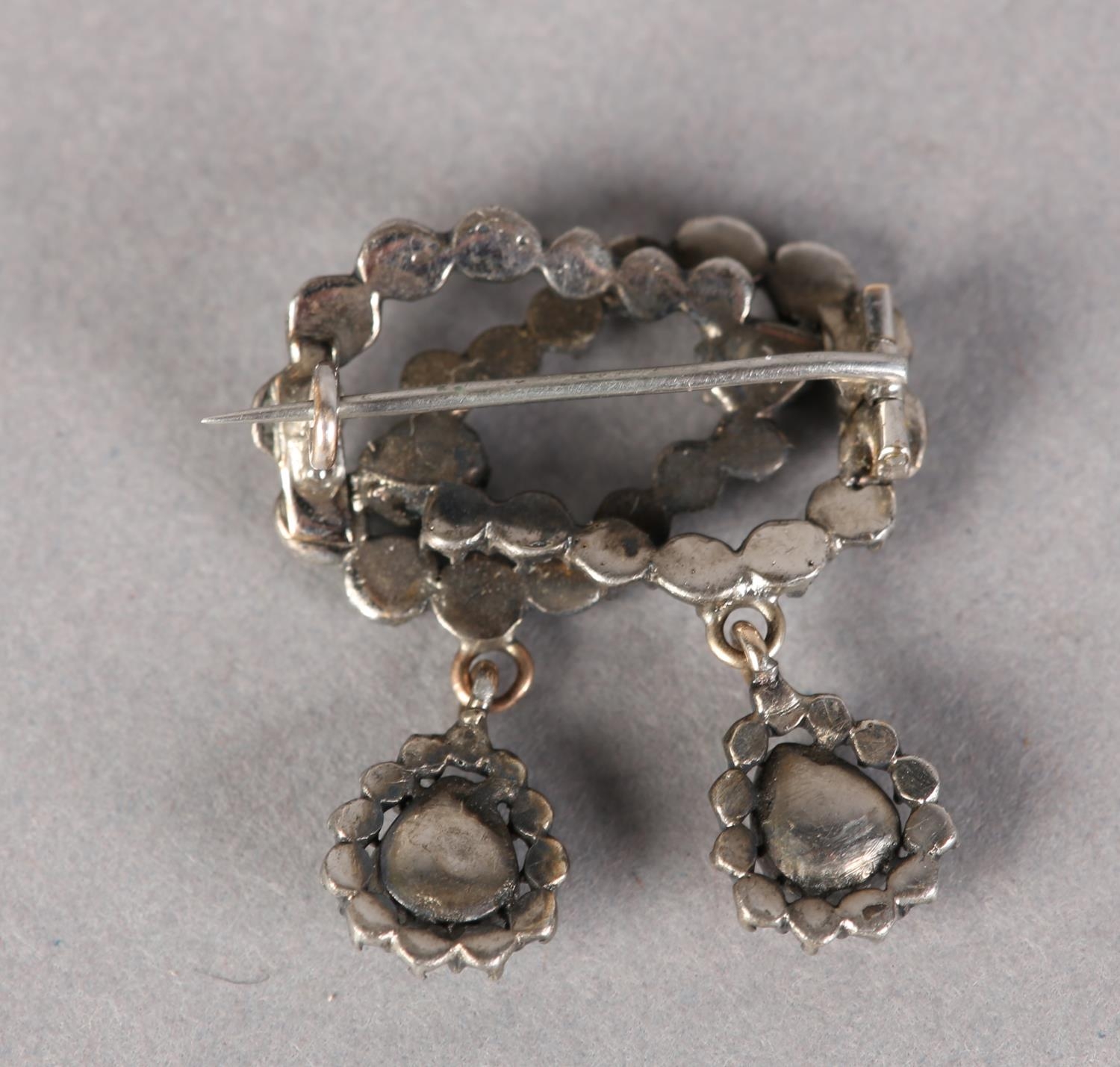 A BOW BROOCH SET WITH 17TH CENTURY ROSE CUT DIAMONDS in closed silver cut down setting including two - Image 3 of 3