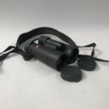 A PAIR OF LEICA ULTRAVID 8 X 42 BINOCULARS, serial no. 1551224, approximate length 15cm