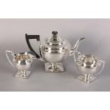 A GEORGE V SILVER THREE PIECE TEA SERVICE, Sheffield 1913, Martin Hall & Co, comprising teapot,