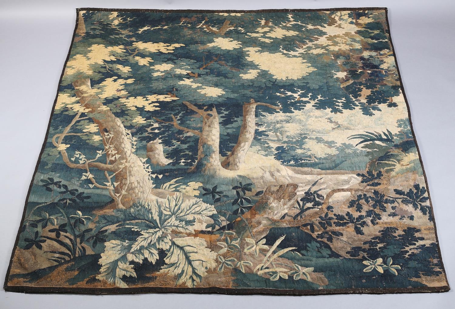 A LATE 17TH CENTURY OR EARLY 18TH CENTURY VERDURE TAPESTRY HANGING, French or Flemish, in a - Image 2 of 7