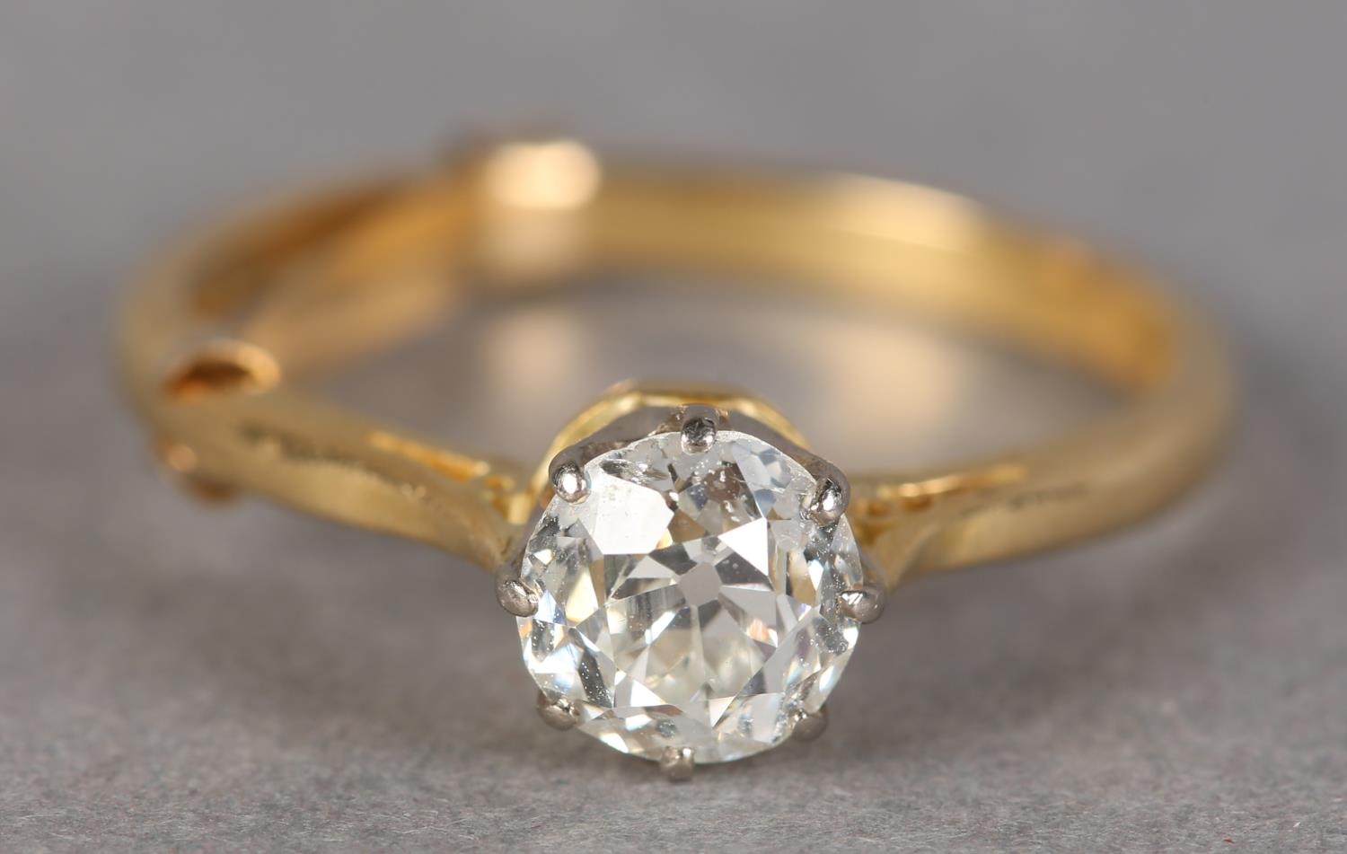 SINGLE STONE DIAMOND RING in 18ct yellow and white gold, the Old European cut stone in crown setting