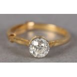 SINGLE STONE DIAMOND RING in 18ct yellow and white gold, the Old European cut stone in crown setting
