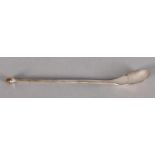 A SCOTTISH SILVER RAT TAILED LONG HANDLED SPOON, with acorn terminal collet set with a cabochon