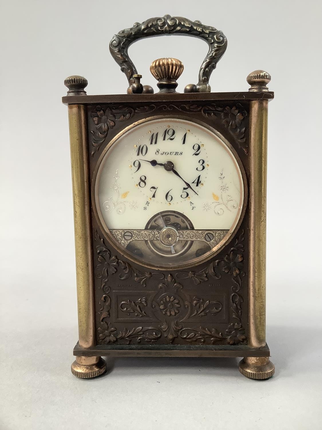 AN EARLY 20TH CENTURY FRENCH TRAVEL CLOCK with 8 day jewelled lever movement, the enamel dial with - Image 3 of 8