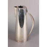 A DANISH STERLING SILVER CHOCOLATE PITCHER of tapered cylindrical form with swept rosewood applied