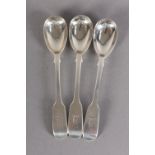 THREE VICTORIAN SILVER MUSTARD SPOONS, fiddle pattern, each engraved with gryphon head crest,