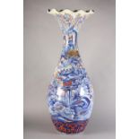 A JAPANESE POTTERY FLOOR VASE, Meiji period of baluster form, flared neck with folded rim, painted
