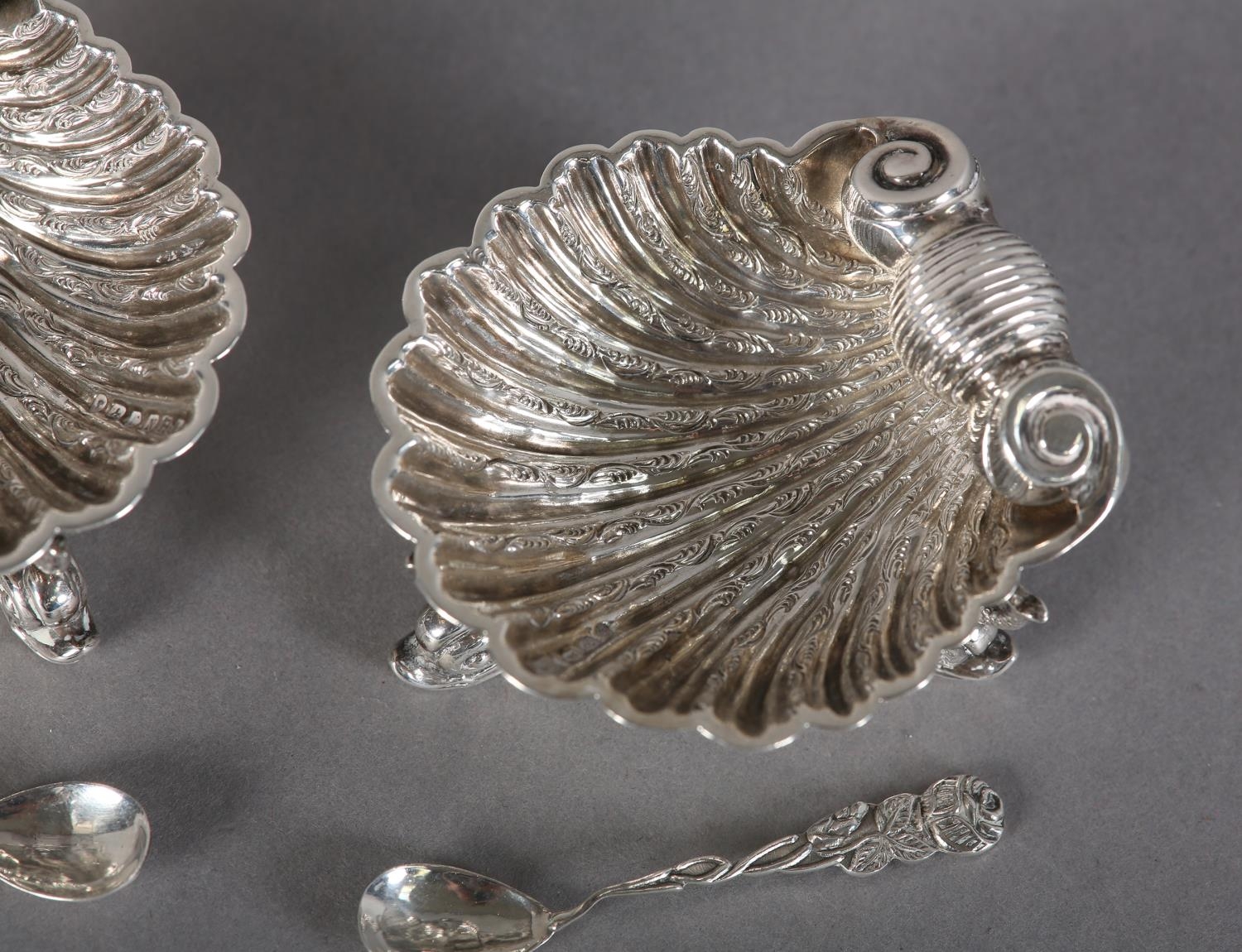 A PAIR OF VICTORIAN SILVER SCALLOP SHELL SALTS, each scroll chased on three dolphin feet, hallmarked - Image 4 of 5