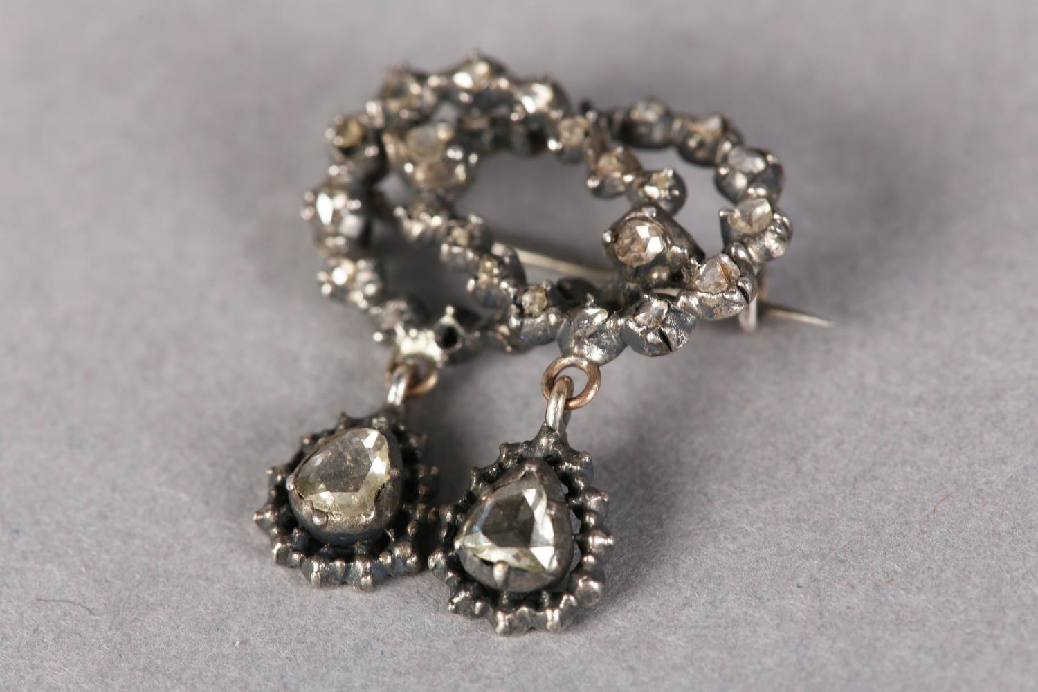 A BOW BROOCH SET WITH 17TH CENTURY ROSE CUT DIAMONDS in closed silver cut down setting including two - Image 2 of 3