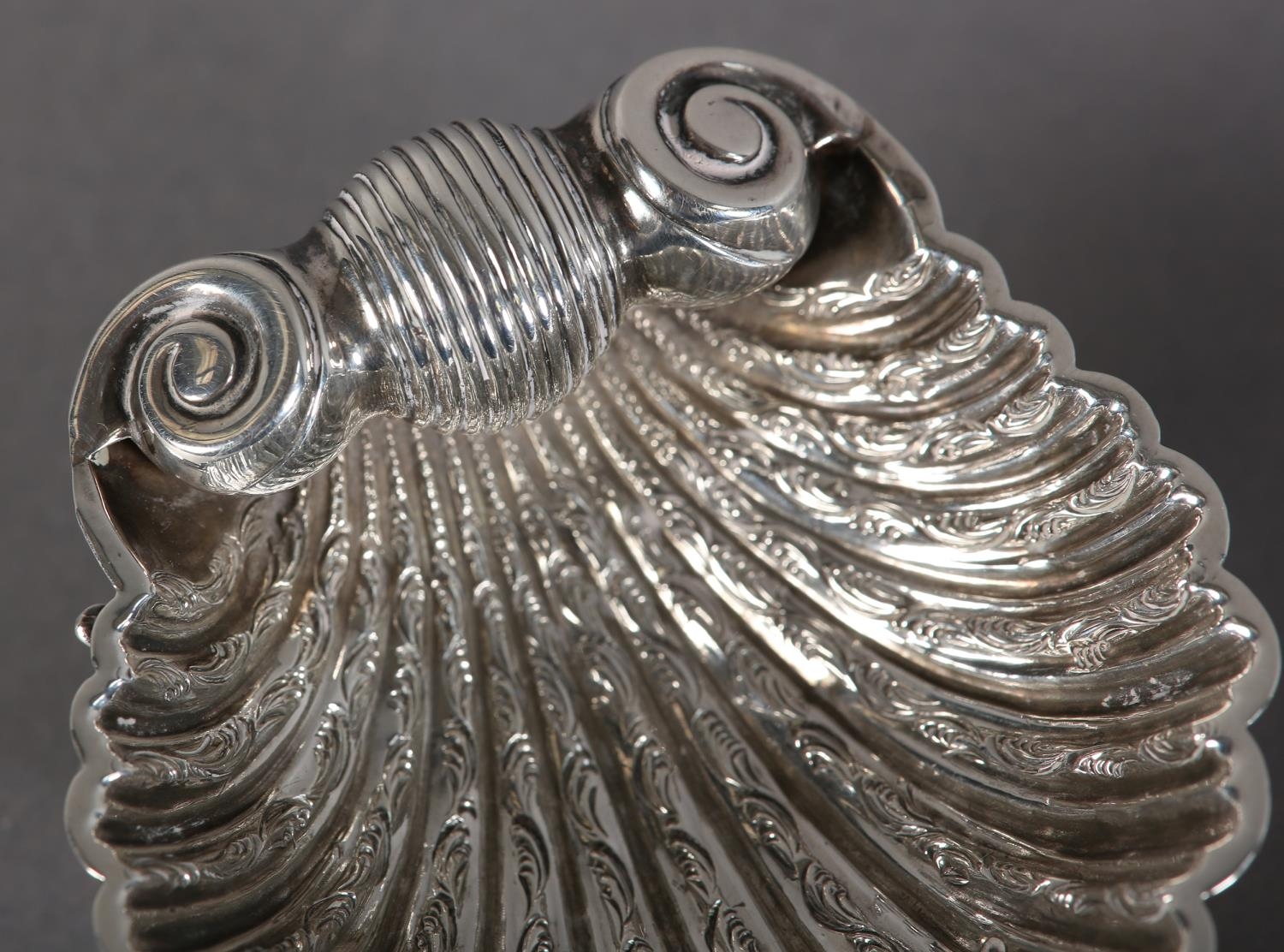 A PAIR OF VICTORIAN SILVER SCALLOP SHELL SALTS, each scroll chased on three dolphin feet, hallmarked - Image 3 of 5