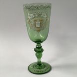 UNIVERSITY OF OXFORD INTEREST: A late 19th century green glass armorial goblet, the bucket bowl