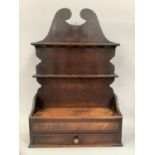 AN EARLY 19TH CENTURY AND MAHOGANY BANDED SPOON RACK, the fret cut back board with broken arch