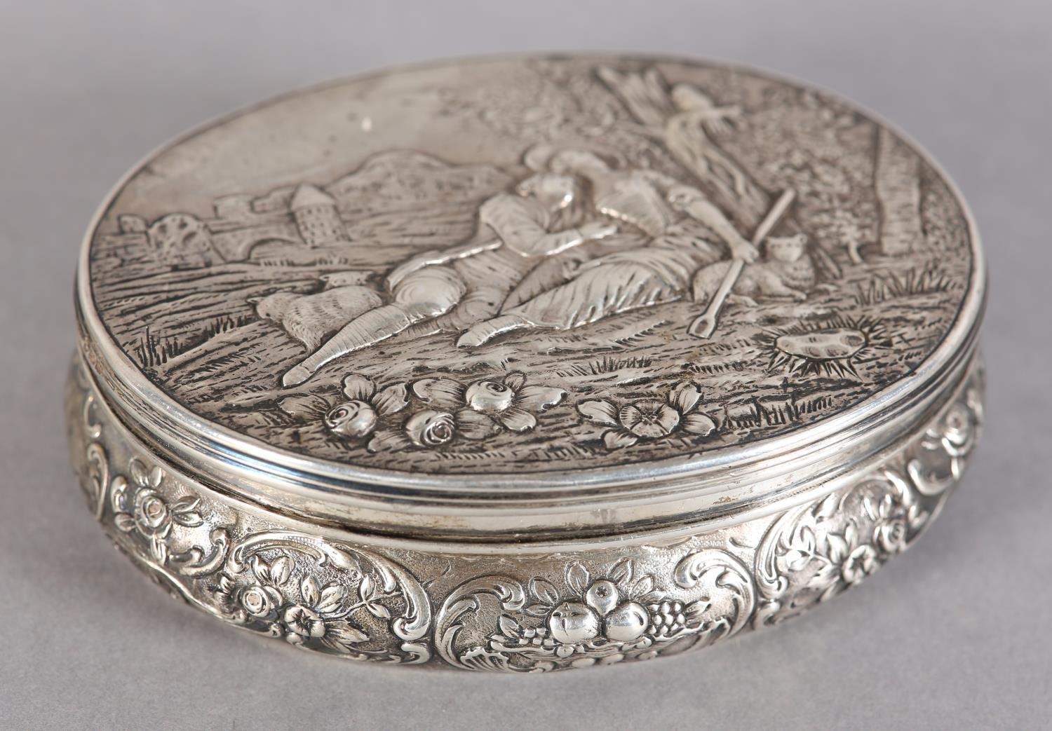 A 19TH CENTURY SILVER BOX, LONDON (import) 1897 for William Moering of oval outline the hinged lid