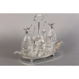 A GEORGE III SILVER EIGHT PIECE BREAKFAST CRUET by John Schofield, London 1809, the boat shape