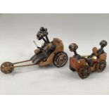 A JAPANESE MEIJI ARTICULATED KOBE TOY modelled as man and woman in cart with limbs animated by