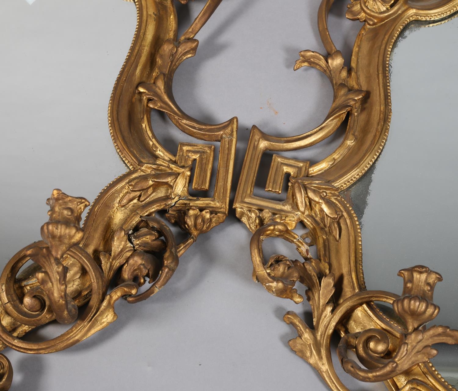 A PAIR OF 19TH CENTURY GILTWOOD AND GESSO GIRANDOLES, with twin candle sconces, the shield shape - Image 6 of 7