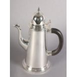 AN IRISH SILVER COFFEE POT, Dublin 1975, by Royal Irish Silver Co, of Queen Ann style ebonised