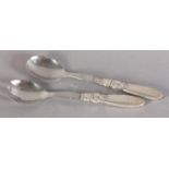 A PAIR OF GEORGE JENSEN SILVER HANDLED SALAD SERVERS c.1936 'Cactus' pattern with stainless steel