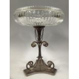 AN EDWARD VII SILVER PLATED AND CUT GLASS FRUIT STAND, the shallow circular bowl raised on triple