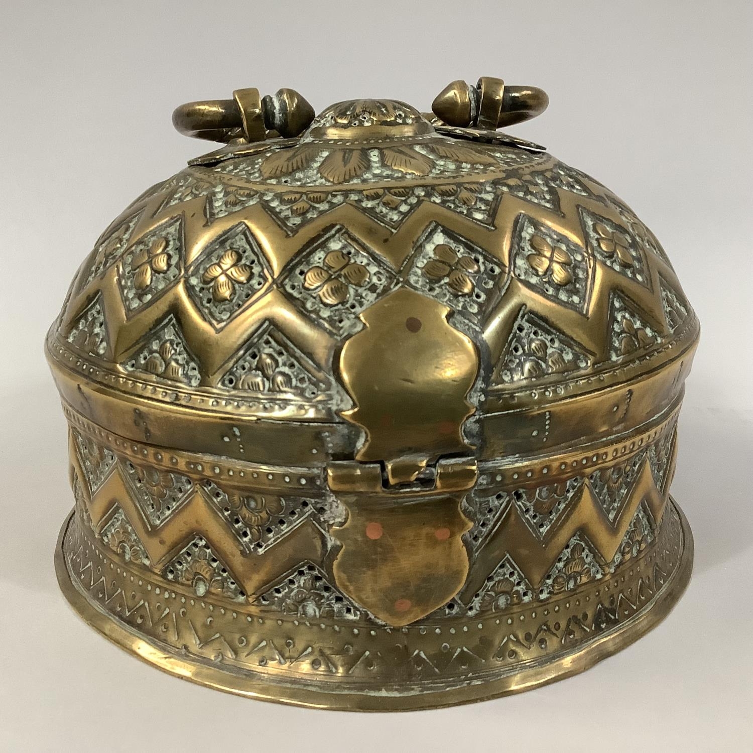 A LATE 19TH CENTURY INDIAN BRASS BETEL NUT PANDAN BOX, circular with domed cover and twisted - Image 4 of 4