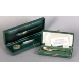 A QUEENS JUBILEE SILVER PAPER KNIFE BY GARRARD & CO, London 1981 in case and a Leicester seal top