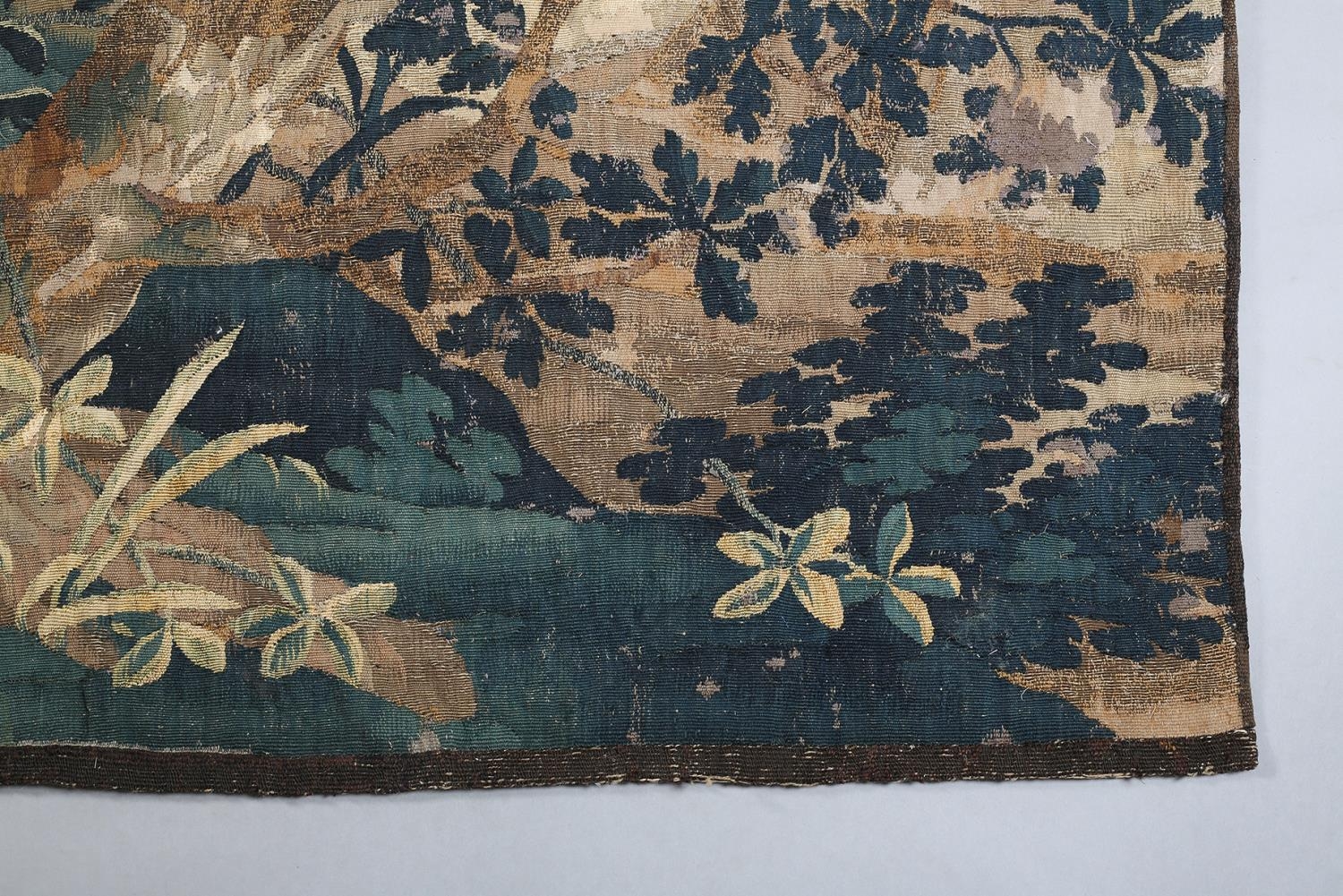 A LATE 17TH CENTURY OR EARLY 18TH CENTURY VERDURE TAPESTRY HANGING, French or Flemish, in a - Image 4 of 7