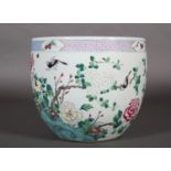 A 19TH CENTURY FAMILLE ROSE JARDINIERE, painted with rocks issuing peony, branches of viburnum and