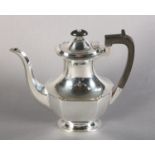 AN ELIZABETH II SILVER COFFEE POT, Sheffield 1962, Frank Cobb & Co Ltd, of oval panelled form,