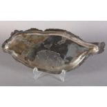 A CHINESE SHAPED OVAL SILVER TRAY, engraved with outline maps of Eastern China and Western Europe,