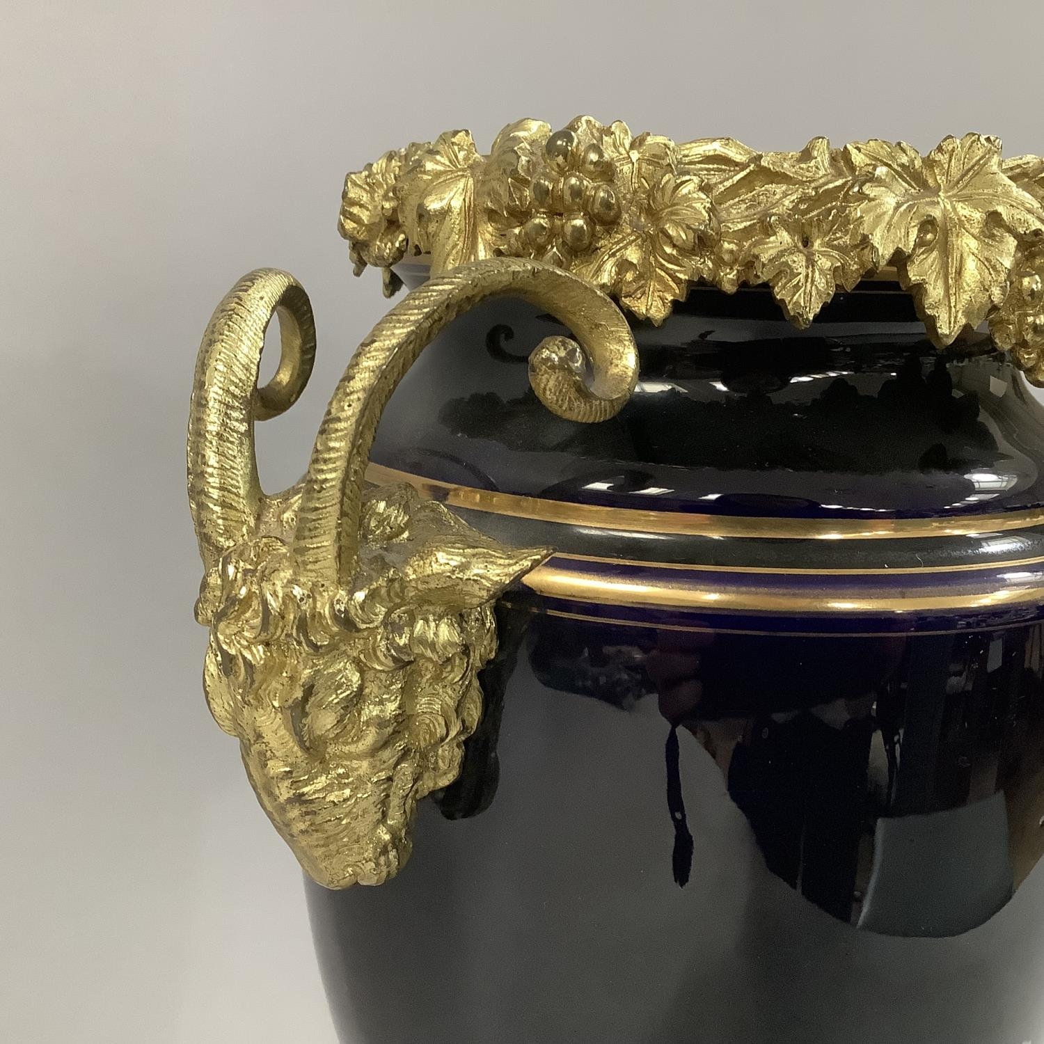 19TH CENTURY FRENCH PORCELAIN AND GILT METAL MOUNTED URN WITH GRAPEVINE RIM, the gros bleu ovoid - Image 2 of 7