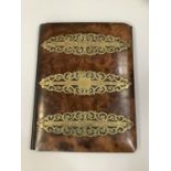 A VICTORIAN BURR WALNUT AND CUT BRASS STRAPWORK BLOTTER, lined in leather, 28cm x 21.5cm