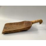 19TH CENTURY FRUITWOOD FLOUR SHOVEL, having curved handle and hanging loop, 55cm long