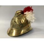 A 19TH CENTURY FRENCH SAPEURS POMPIERS DE FES BRASS FIREMAN'S HELMET, of Adrian pattern style,