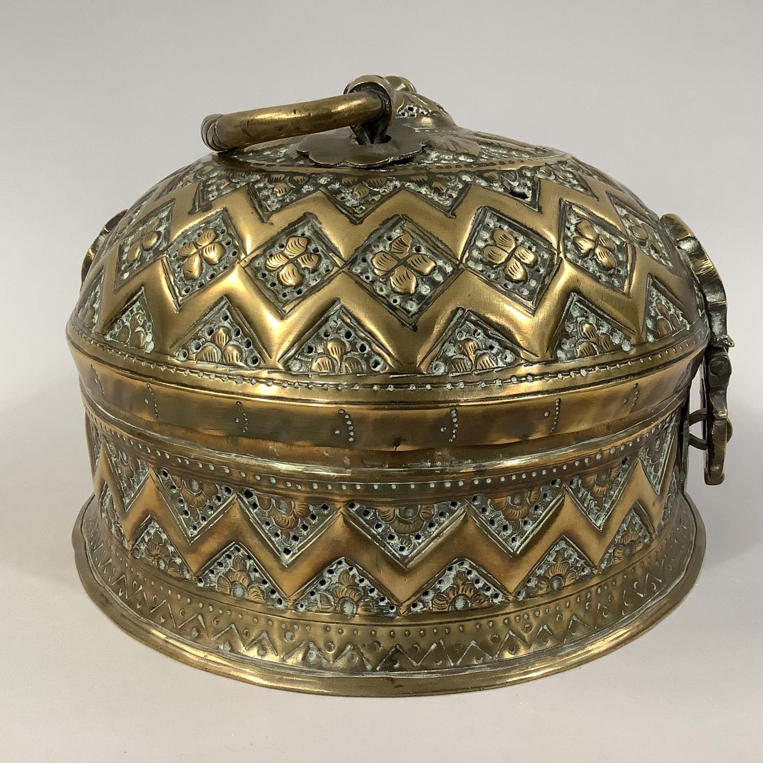 A LATE 19TH CENTURY INDIAN BRASS BETEL NUT PANDAN BOX, circular with domed cover and twisted - Image 3 of 4