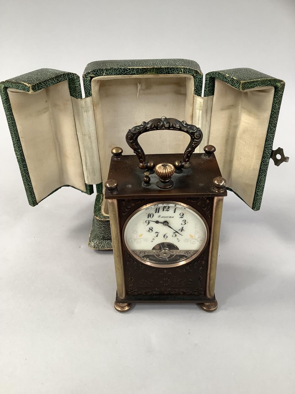 AN EARLY 20TH CENTURY FRENCH TRAVEL CLOCK with 8 day jewelled lever movement, the enamel dial with - Image 2 of 8