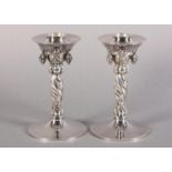 A PAIR OF GEORG JENSEN SILVER GRAPEVINE CANDLESTICKS No. 263A both signed Y10 9255 Denmark Georg