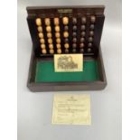 Remy Martin Cognac 'Four in a Row' game bound in wood box with green leather inset to the top