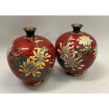 Pair of Japanese cloisonne vases inlaid with flowers in yellows and pinks