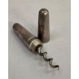 An early 19th century silver plated folding cork screw by Drew & Sons, Piccadilly Circus, in a