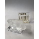 A Lalique figure of a bison in frosted and clear glass, rectangular base, etched signature 'Lalique,