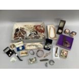 A collection of mid to late 20th. Century costume jewellery with necklaces, wrist watches,
