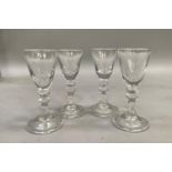 Set of four Baccarat wine glasses on knop stems, 13cm high