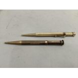 A George V propelling pencil in 9ct gold by S Mordan & Co, the heptagonal barrel with engine turning