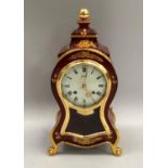 20th century Le Castel bracket clock in red lacquer with gilt highlights, 31cm high