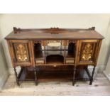 A rosewood inlaid base to an empire cabinet with two inlaid panel doors, inlaid with griffins and
