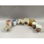 Eight royal commemorative ware cups for Edward VIII including two Wedgewood examples.