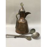 Large copper and brass Dallah coffee pot, with heavily etched body and Islamic Star and Crescent