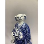 Three Chinese blue and white porcelain zodiac figures modelled as a goat, dog and pig, max height