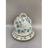 19th century stilton bell the handle moulded as leafage with applied flowering vine in duck egg blue